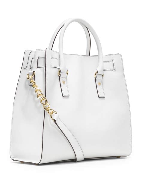 michael kors drawstring bag white|Michael Kors saffiano tote large.